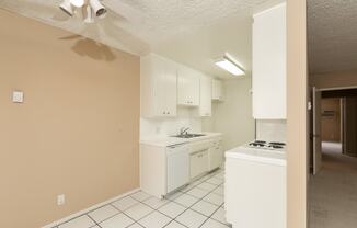 Kitchen with White Appliances and White Cabinets