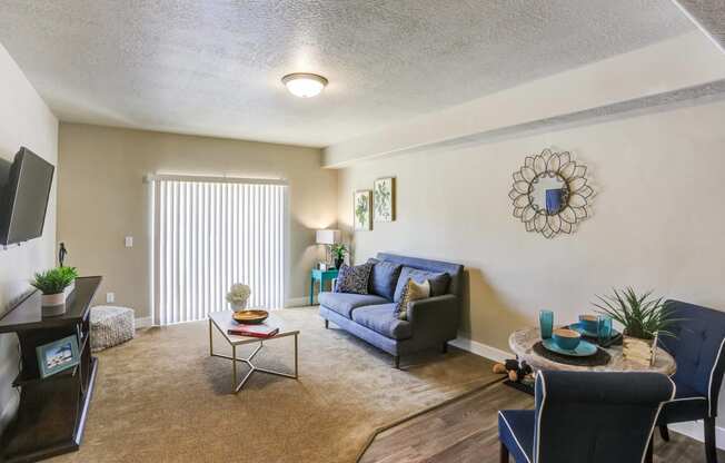 a living room with a couch chair and coffee table at The Beckstead, Utah