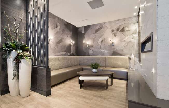 a lobby with couches and a coffee table at Apartments at Denver Place, Denver, 80202