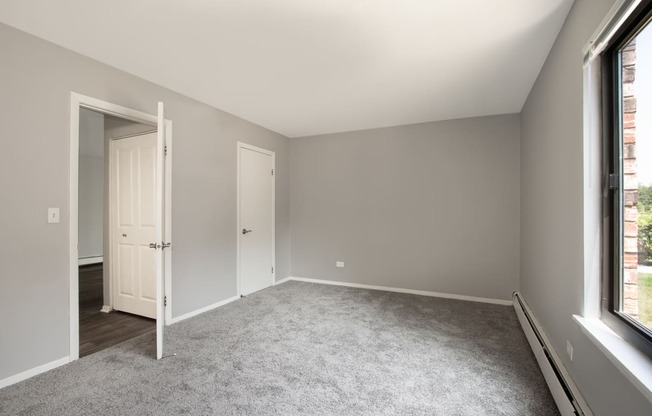Spacious Bedrooms with Windows at Emerald Pointe Apartments, Vernon Hills, Illinois