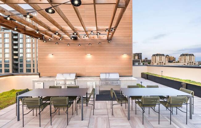 Gather friends and fire up the grill at Modera Golden Triangle's rooftop grilling area, offering breathtaking panoramic views of Denver.