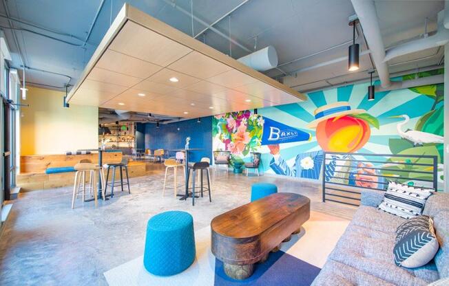 Resident lounge and mural wall  at The Baxly, Savannah, Georgia