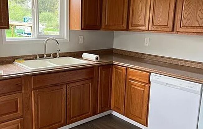 Fenced corner lot centrally located 2 bedroom 1 bath House