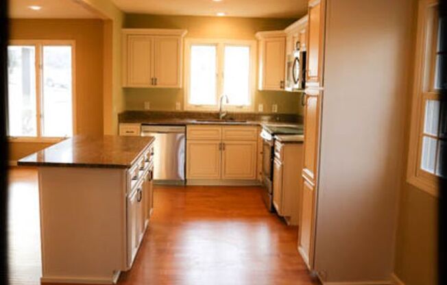 Pottery Barn-Style Home with Walkout Basement in Prime Location