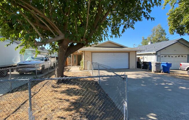 Renovated 3 Bed Home with a New Kitchen, Paint & Laminate Flooring!