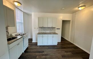 For Rent: Classic Elegance at 2504 N Calvert St – Your Timeless Urban Retreat!