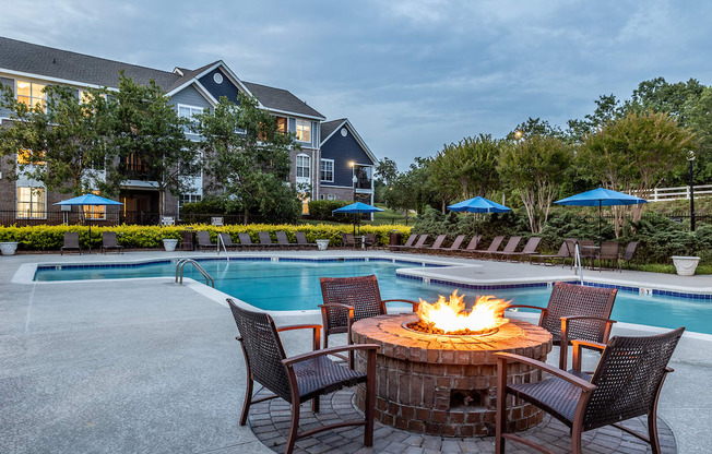 our apartments offer a swimming pool with a fire pit