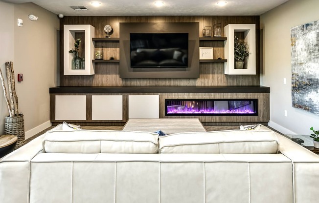 Luxury clubhouse with seating area at AXIS apartments in Papillion, NE