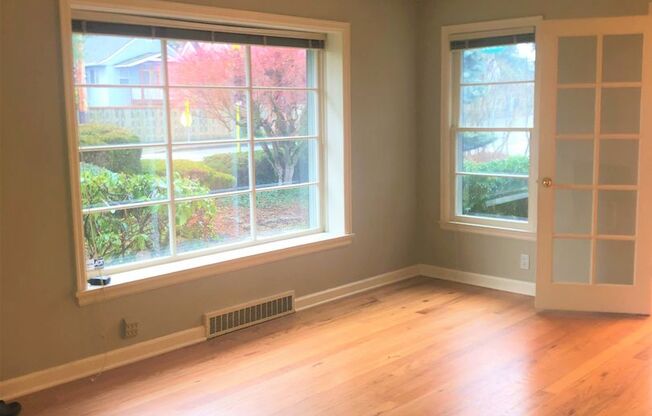 Location, Location!! Charming 4 bedroom 2 bath House in View Ridge, Across the street from Sandpoint Golf and County Club.