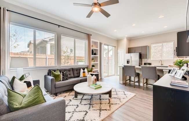Living Room With Ceiling Fan at Avilla Heritage, Grand Prairie, Texas