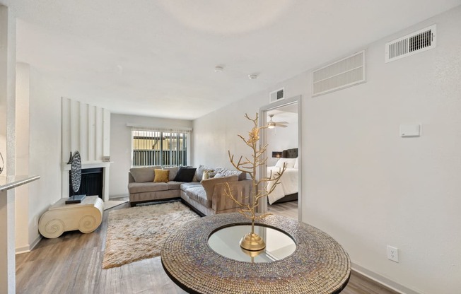 a living room with rainbow colored ceilings and a round table