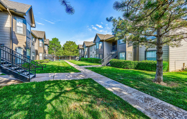 the preserve at ballantyne commons apartments with walkways and grass