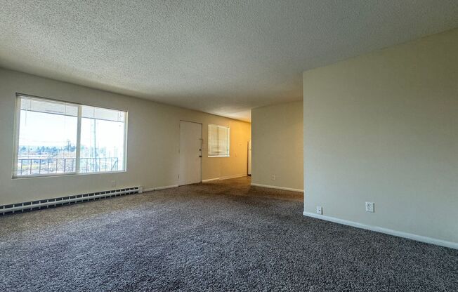 Spacious Montavilla 2 Bedroom Top Floor Unit- Great Natural light- Carport- Fur Babies Welcome