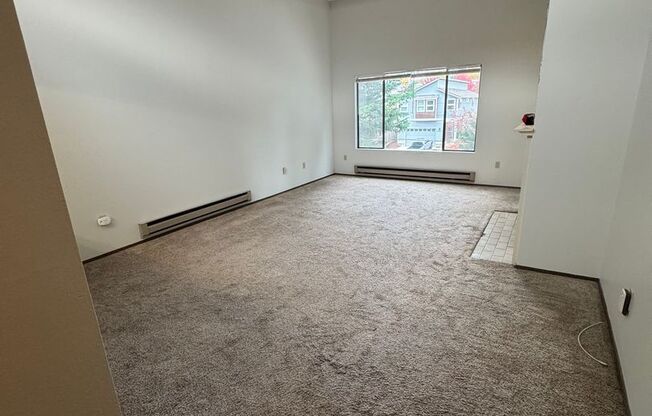 2 Bedroom 1 Bath Burien Condo 995sf, Fireplace, Balcony, One Car Garage with Storage