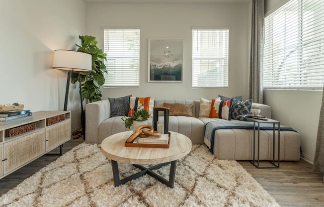 a living room with a couch and a coffee table