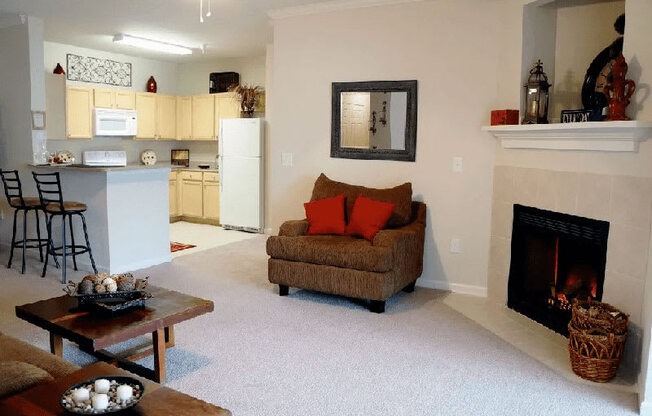 Living Room and Kitchen with bar stools at Village on the Lake Apartments, North Carolina