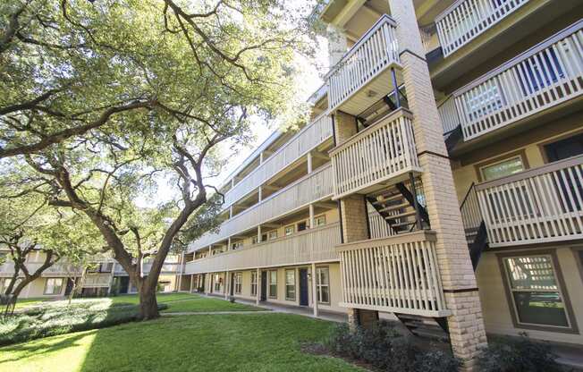 This is a photo of the courtyard at Harvard Square Apartments in Dallas, TX.