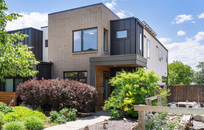 Modern 4BR/3.5BA Duplex with Finished Basement & Solar in Prime Denver Location