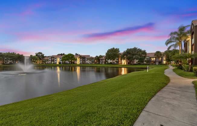 the walkway around the lake at the preserve at sunset