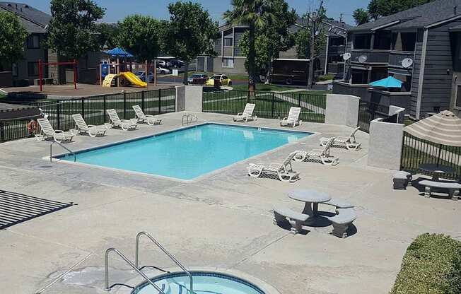 Comfy Pool Chairs at Park West Apartments, California