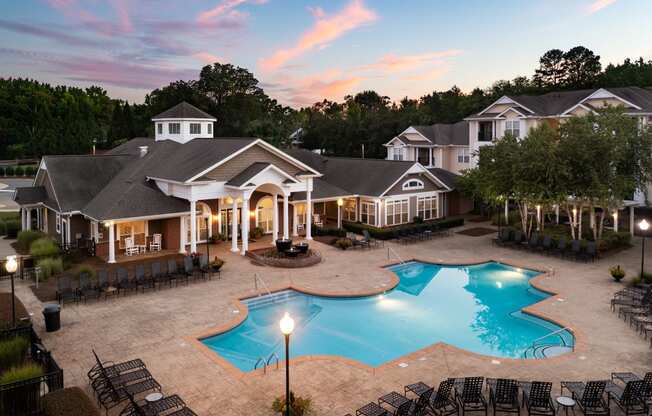 Outdoor Pool During Dusk at Abberly Woods Apartment Homes, Charlotte, North Carolina