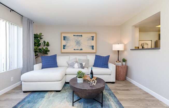 a living room with a couch and a coffee table