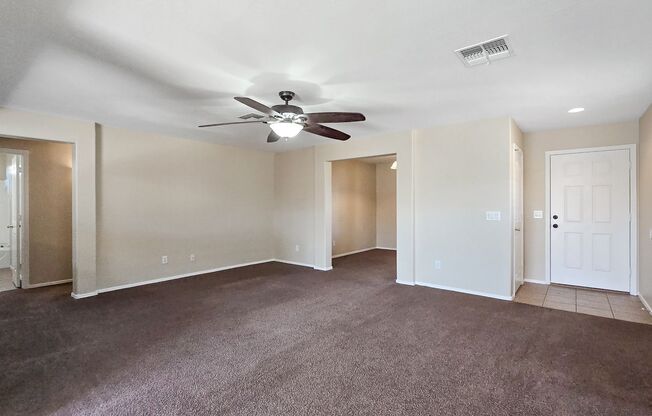 Three bedrooms plus a den at an affordable price! New carpet!