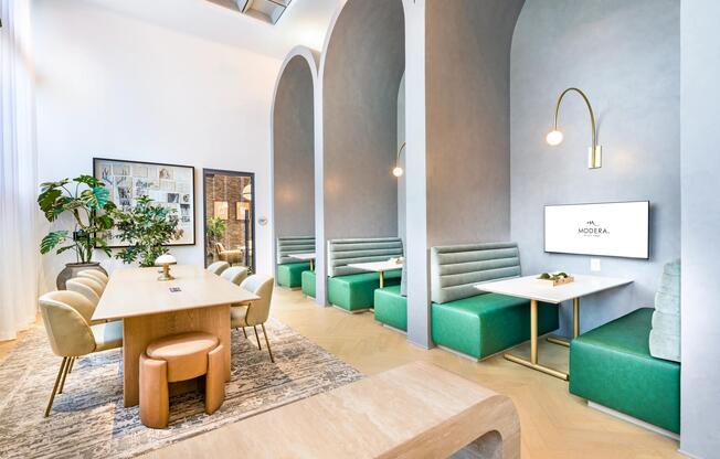 Community cowork and dining lounge with arched alcoves and shared tables, offering a refined place to gather near Nashville’s Music City energy and creative scene.