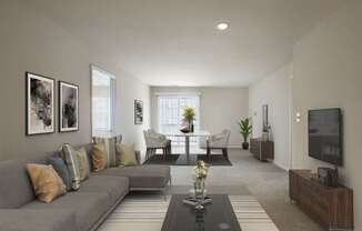 Living room with couch at The Apartments at Owings Run, Maryland, 21117