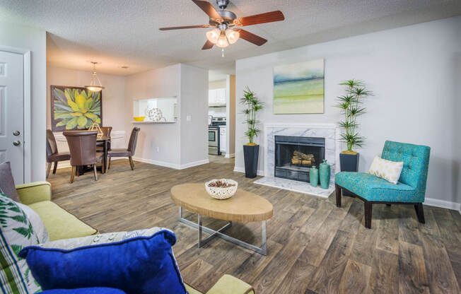 Living Room With Dining Area at The Pointe at Irving Park, Greensboro