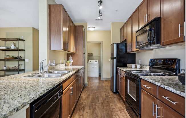 Black appliances in kitchens  - Acadia at Cornerstar Apartments