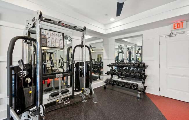 the gym is equipped with weights and cardio equipment at Link Apartments® Brookstown, Winston Salem, 27101