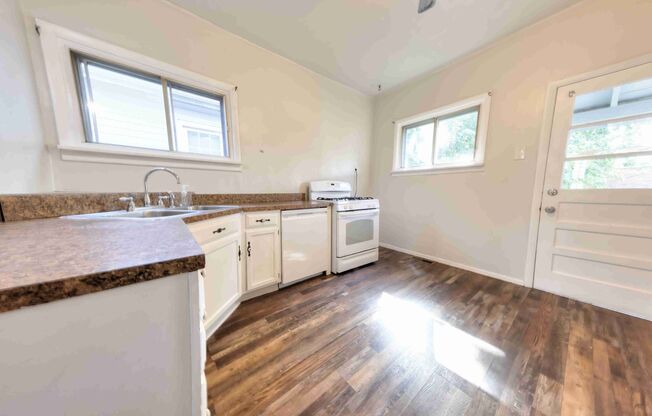 Very nice single family home with refinished hardwood and a very large open living room.