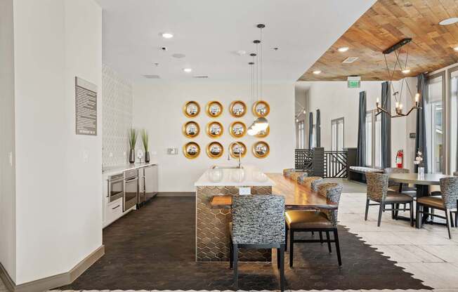 A modern dining room with a wooden table and chairs.