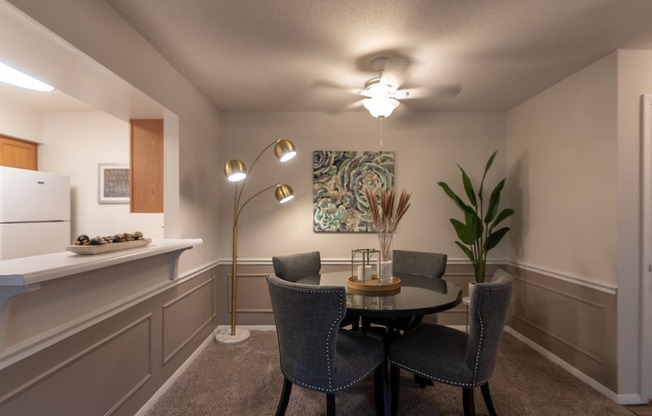 This is a photo of the dining area in the 822 square foot, 2 bedroom, 1 bath floor plan at Village East Apartments in Franklin, OH.