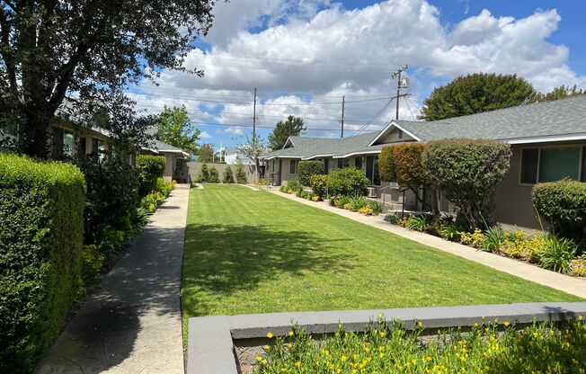 Single-story Two Bedroom, One Bath with Interior Laundry & Private backyard