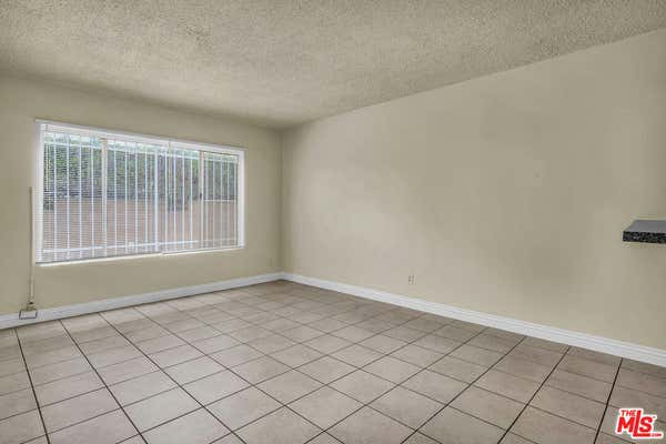 1087 W 39 ST