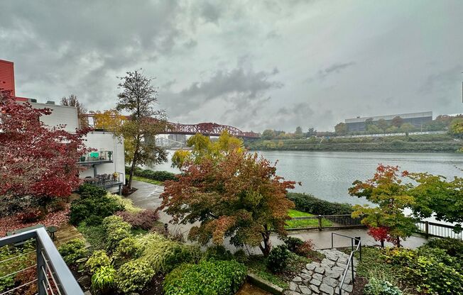 Top-Floor Riverfront Living with Broadway Bridge Views | 2 Bed + 2 Bath + Parking