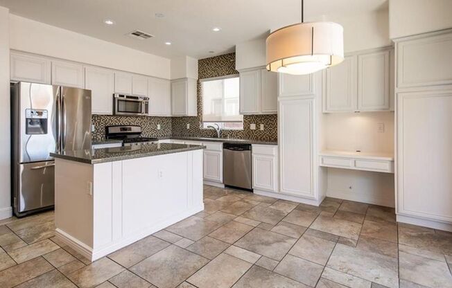 Kitchen has been upgraded and features modern appliances.