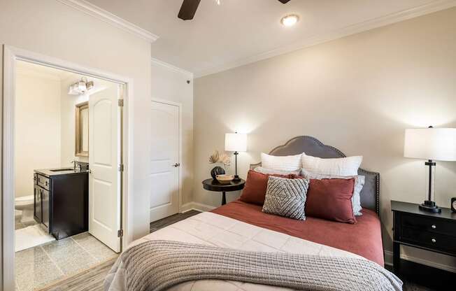 a bedroom with a bed and a closet  at Arlo Luxury homes Apartments, Little Rock, AR,72210