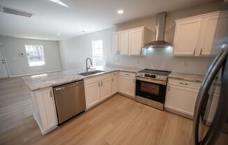 Completely Renovated 3 Bedroom, 2.5 Bath Home with all new SS Appliances, Storage Shed, and Fenced in Yard