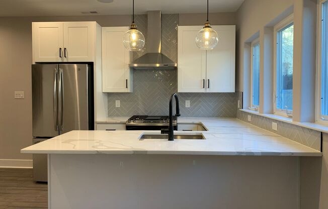 Incredible 4-Bedroom Townhouse in the Heart of Brewerytown! One-Car Garage Included!