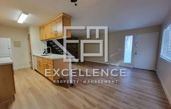 2/1 Townhouse - Updated Kitchen, Community Pool, Storage, One Side of 2 Car Garage (For Storage)