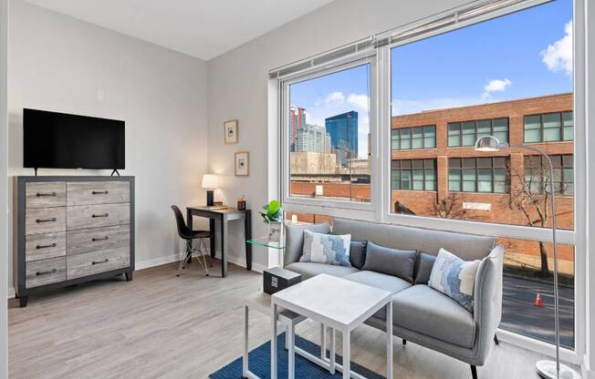 Living Room With TV at 23rd Place Apartment, Chicago, IL