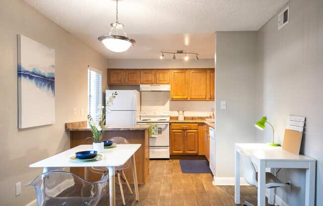 an open kitchen and dining room with a white table and chairs at Granite Bay, Phoenix, Arizona, 85023