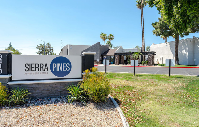 The image shows the entrance to Sierra Pines Apartment Homes.