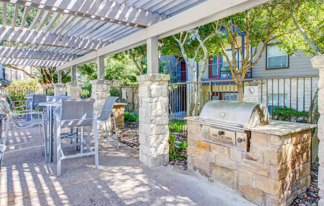 Abelia Flats - Outdoor Grill Area under a Gazebo and Surrounded by Lounge Seating