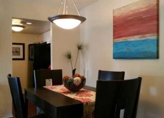 Thumbnail 8 of 22 - Dining Area and light at L&#x27;Estancia, Sarasota, 34231