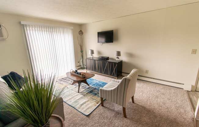 This is a photo of the living room in the 705 square foot 2 bedroom, 1 bath apartment at Lisa Ridge Apartments in the Westwood neighborhood of Cincinnati, Ohio.