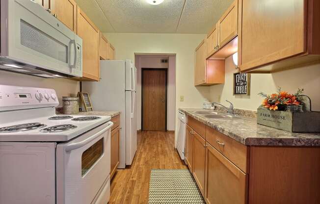 a kitchen with white appliances  at France, North Dakota, 58103